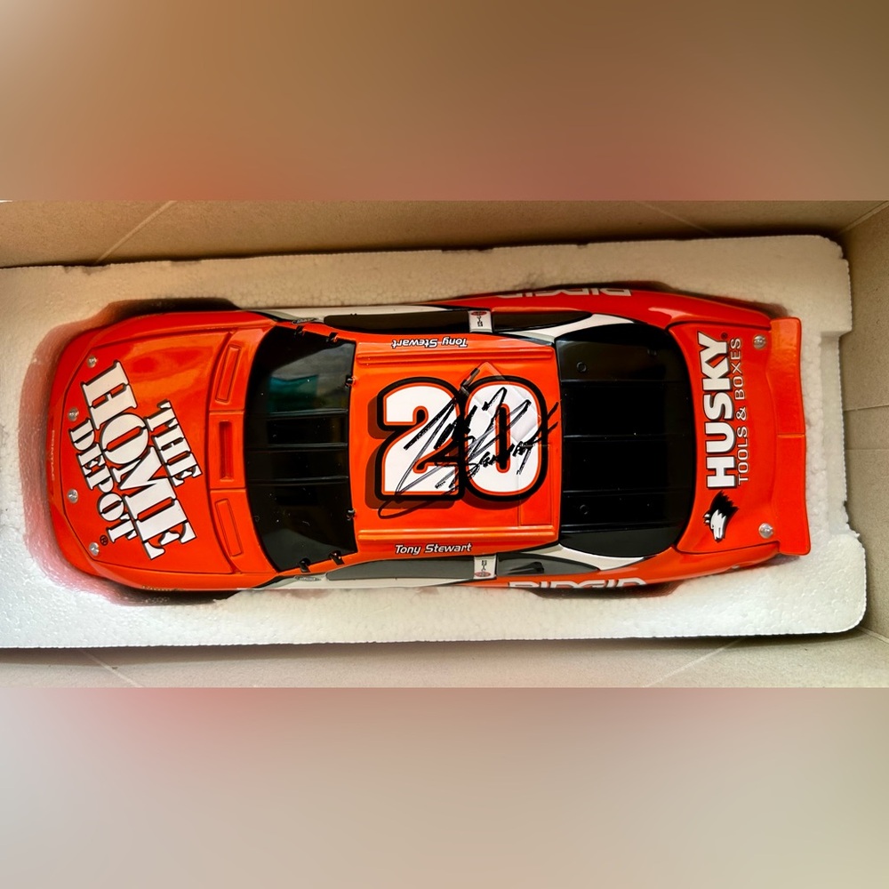 Autographed Tony Stewart 1:24 scale, officially licensed NASCAR limited edition